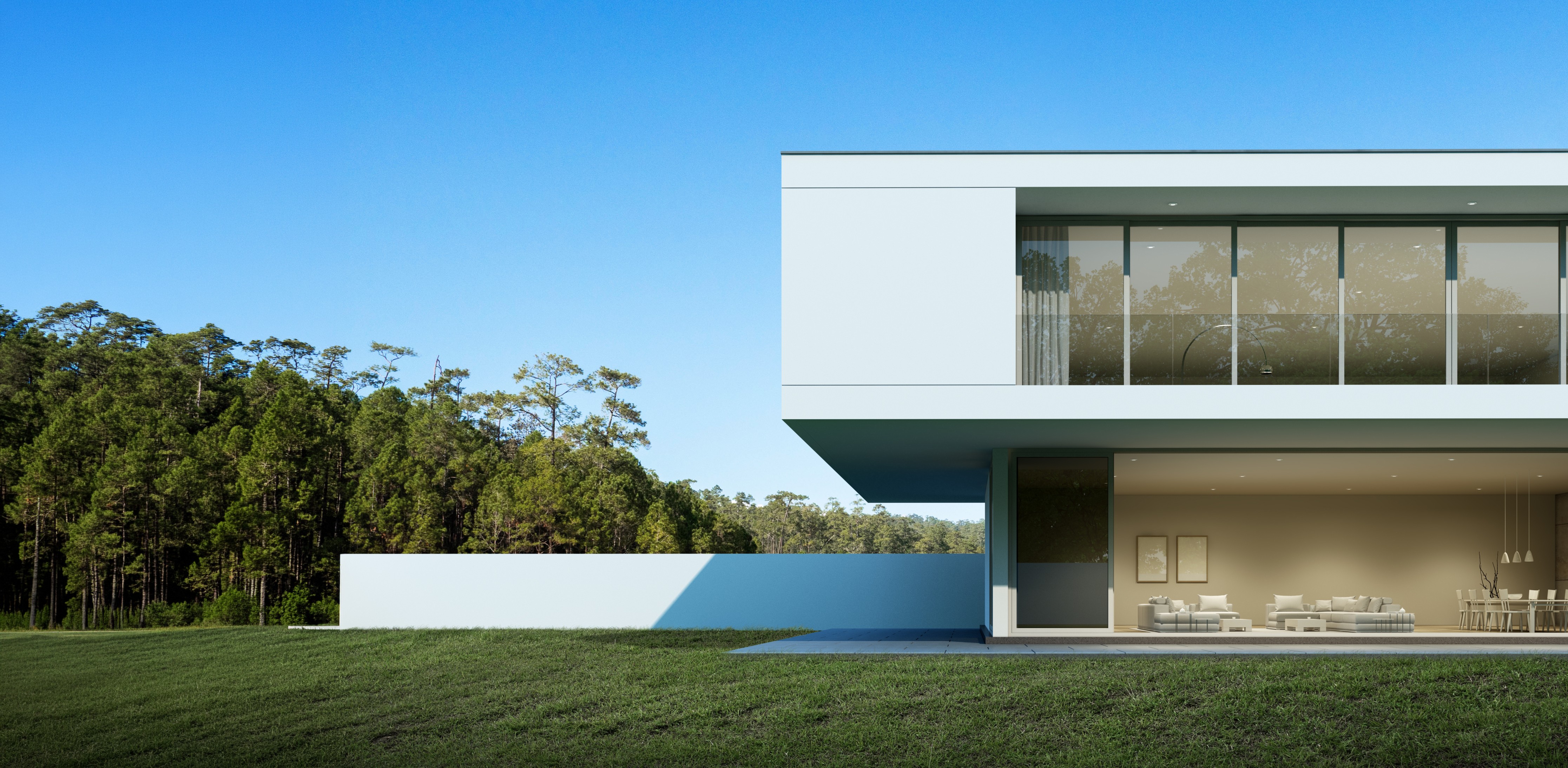 Modern white villa with glass walls and a lawn – The Design Organization